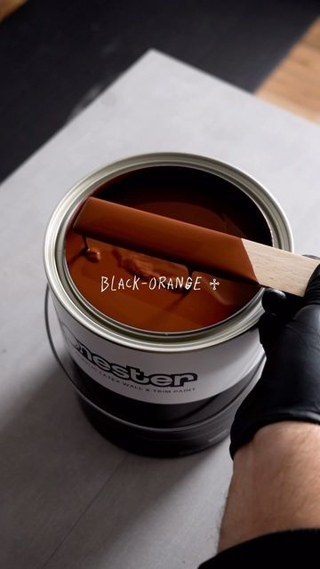 Dark Coloured Bathrooms, Orange Black Bathroom, Black Orange Paint, Orange And Black Office, Black Painted Room, Moody Bathroom Paint Colors, Tonester Paints, Dark Orange Paint, Red And Black Interior Design