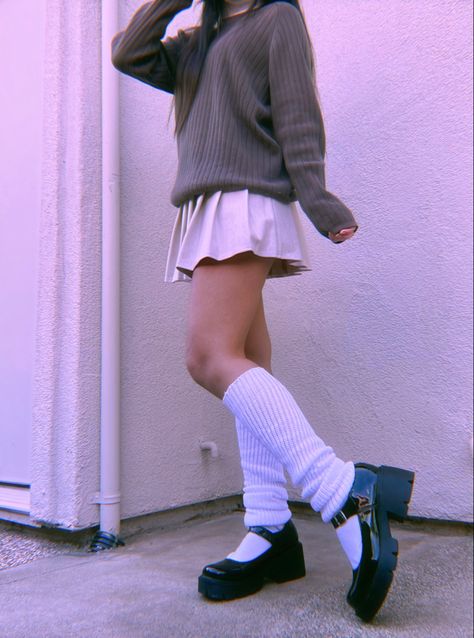 80s inspired winter outfit!! white turtleneck, brown sweater, tan skirt, white legwarmers, black platform mary janes #outfits #outfitoftheday #outfitinspiration #80sfashion #legwarmers #skirtoutfits #winteroutfits #aesthetic #aestheticoutfits Mary Janes Shoes With Leg Warmers, Outfits With Doll Shoes, How To Style Black Mary Janes, Outfits To Go With Mary Janes, Mary Jane Shoes With Leg Warmers, Outfit Inspo With Mary Janes, Cute Legwarmers Outfit, Outfits With Platform Mary Janes, Legwarmers Outfit Aesthetic