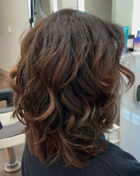 Messy Shag for Thick Wavy Hair Short Haircuts For Slightly Wavy Hair, Short Haircut Styles For Wavy Hair, Naturally Wavy Short Hair Mid Length, Layers On Short Wavy Hair, Layers For Wavy Hair Short, Shag Wavy Hair Short, Wavy Layered Bob Medium, Wavy Short Thick Hair, Choppy Layers For Wavy Hair