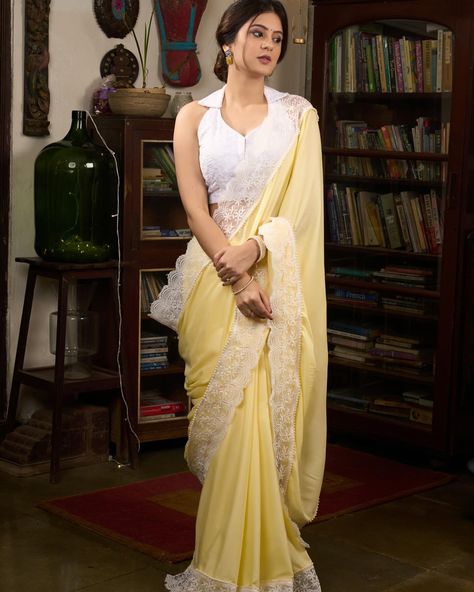 This pastel yellow saree is made from soft modal cotton and features delicate lace details. The lightweight fabric is perfect for any occasion and provides a comfortable fit. Elevate your style with this elegant and versatile piece. #sujatra #sujatraglobal #sujatrasarees #modalcotton #cottonsaree #pastelsaree #pastelyellow #softmodal #delicatelaces #lacesaree #summeryellow Yellow Cotton Saree, Lace Saree, Yellow Saree, Summer Yellow, Book Art Diy, Pastel Yellow, Cotton Saree, Blouse Piece, Light Yellow