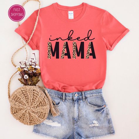 🔥 Get ready to ROAR this Mother's Day with our Inked Mama Leopard Print T-shirt! 🐆👩‍👧‍👦 Treat your mom to this fierce and stylish top for only $14.45! 💸 Don't miss out on this must-have gift for #MothersDay2021! #GiftsForMom #ShortSleeveTee #LeopardPrint #TrendyTees #MomLife #InkedMama #Motherhood #MomFashion https://www.etsy.com/listing/1694617662/inked-mama-t-shirt-leopard-print-t-shirt Stylish Top, Your Mom, Mom Style, Treat Yourself, Get Ready, Mom Life, Mother's Day, Print T Shirt, Gifts For Mom