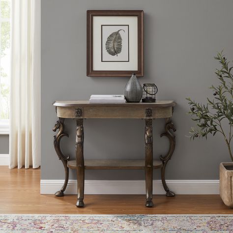 Grey wash finish over earthy brown wood tones lend to a traditional aesthetic. Pewter coating offers a beautiful muted texture on the cast iron legs. 4 cast iron legs with horse heads and hooves support the structure. Linon Farmhouse Greywash Console Table in Gray | PLWS759 Cast Iron Legs, Horse Heads, Pewter Grey, Grey Flooring, Led Floor Lamp, Universal Furniture, Grey Wash, Wooden Shelves, Brown Wood