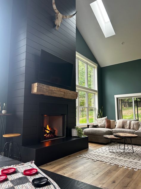 Black Fireplace Light Floors, Dark Green Wall With Fireplace, Green Wall Black Fireplace, Green Walls Black Fireplace, Tricorn Black Fireplace Wall, Black Fireplace Green Walls, Dark Green Fireplace Wall, Green Shiplap Fireplace, Tricorn Black Fireplace