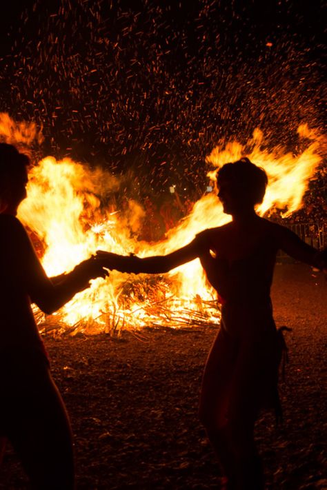 Bonfire In The Woods, Fire Ritual Aesthetic, Dancing Around Fire Aesthetic, Fire Ritual, Witches Dancing Around Fire, Beltane Fire Festival, Dancing Around Campfire, Fire Night, Pagan Festivals