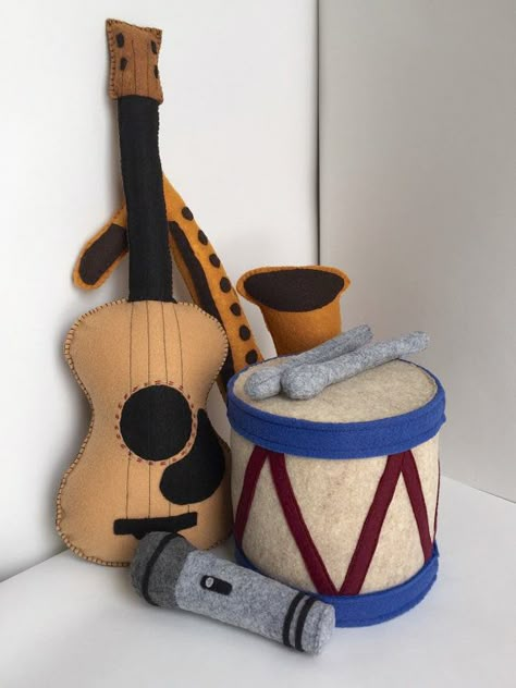 These adorable handmade instruments will have your little one grooving along with all your favorite tunes in no time. Perfect for pretend play with Baby Instruments, Music Nursery, Instruments Music, Toy Instruments, Music Toys, Diy Nursery, Music Instrument, Fabric Toys, Baby Music