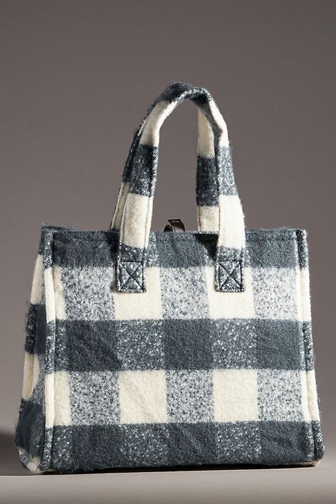 Polyester; cotton lining Removable top zip pouch Two inner slip pockets One inner zip pocket Snap styling Imported | Plaid Cozy Tote by Anthropologie in Black, Women's Anthropologie Bags, Zip Pouch, Time To Celebrate, Womens Tote Bags, Color Coding, Zip Pockets, Anthropologie, Pouch, Purse