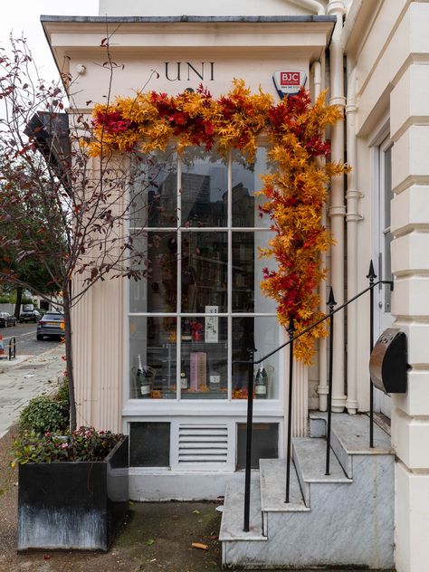 Halloween Window Display, Autumn Window Display, Flower Arches, Fall Windows, Holiday Window Display, Front Shop, Halloween Window, Autumn Display, Porch Entry