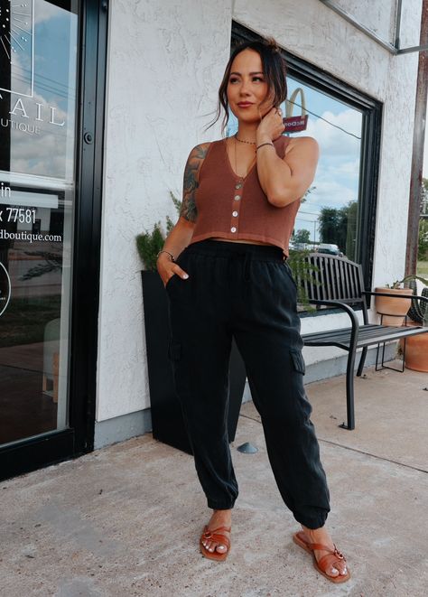 Stay comfortable while chilling in our Hey Sue tencel cargo jogger pants with elasticized waistband, drawstring closure and a total of six pockets. 100% Tencel High Rise Fit WASHED BLACK Elastic Drawstring Waist Wash Cold Only, line dry Fabric does not stretch, except waist and ankles Front Rise: 10.5" Inseam: 24" Cargo Pants Outfit Joggers, Big Valley Jamboree Outfits, Black Joggers Summer Outfit, Black Drawstring Pants Outfit, Black Cargo Joggers Outfits Women, Camp Leader Outfits, Summer Joggers Outfit Women, Black Cargo Joggers Outfit, Cargo Jogger Outfit