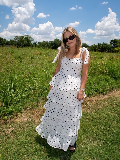 DETAILS: Sweetheart neckline Tie straps Tiered skirt Lined True to size Carleigh is 5'2" with a 26" waist + 34B bust and is wearing a small. FABRIC: Self: 90% Lyocell, 10% Polyester Lining: 100% Cotton White And Black Polka Dot Dress, Poka Dot Dress, Black And White Maxi Dress, Polka Dot Midi Dress, Black White Maxi Dress, Winter Ball, Prom 2023, Polka Dot Maxi Dresses, White Polka Dot Dress