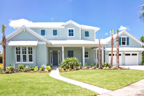 White House Blue Accents Exterior, Metal Roof Beach House, White Roof House Exterior Colors, White Beach House Exterior, Beach Houses Exterior, Coastal Cottage Exterior, Coastal House Exterior, Blue Beach House, White Beach House