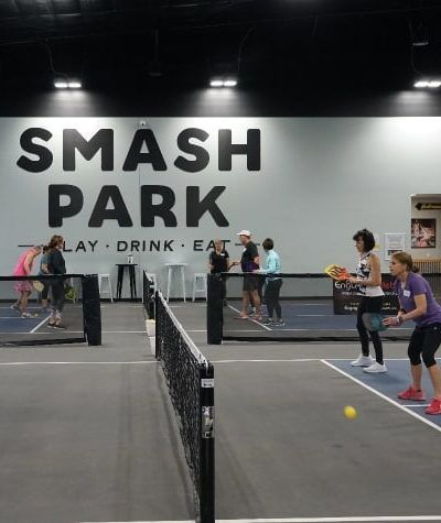 PLAY PICKLEBALL Smash Park is your one-stop shop for pickleball in West Des Moines. With 6 pickleball courts, a pro shop full of gear and sportswear, leagues and tournaments, and … Pickleball Court Design, Indoor Pickleball Court, Sport Facility, Indoor Pickleball, Pickleball Tournament, Pickleball Design, Pickleball Courts, Sport Center, Badminton Court