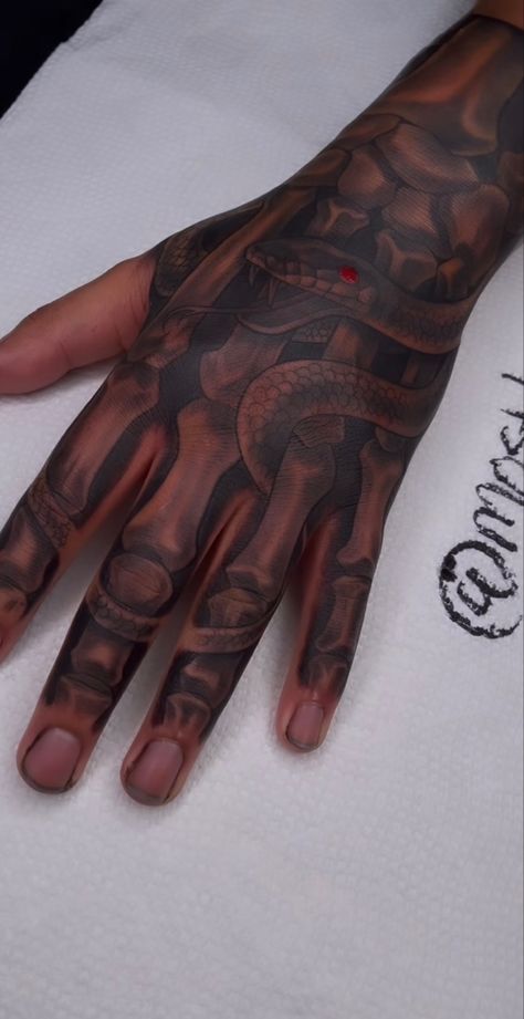 Man Hand Tattoo Design, Skeleton Hand Tattoos Men, Hand Tat Ideas Men, Good Hand Tattoos For Men, Tattoos On Hands For Men, Skeleton Tattoos Hand, Hand Tattoos On Black Guys, Snake Hand Tattoo Men, Hand Tattoos For Guys Snake