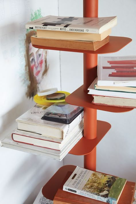 Story Bookcase | AFTEROOM Story Bookcase, Books Organization, Bookcase Design, Drum Table, Steel Columns, Side Table Design, Book Storage, Bookcase Shelves, Table Lamp Design