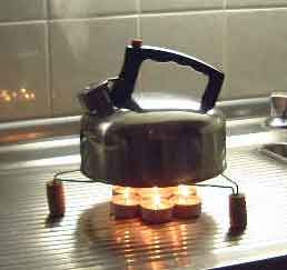 Wick Burners: Martin's Tea Time Candle Stove | Improved Biomass Cooking Stoves Tea Light Stove, Candle Stove, Emergency Preparedness Binder, Emergency Hacks, Storm Preparedness, Candle Heater, Diy Heater, Emergency Candles, Terra Cotta Pot Crafts Diy