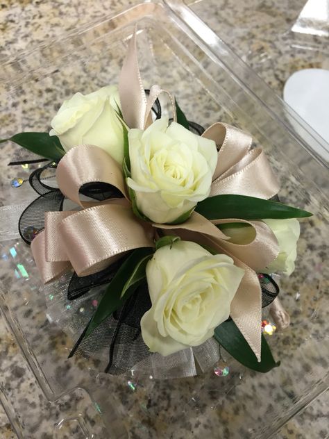 Wristlet corsage with white spray roses, champagne satin ribbon and iridescent… Hair Bow Wedding, Wristlet Corsage, Prom Flowers Corsage, Homecoming Flowers, Prom Corsage And Boutonniere, Homecoming Corsage, White Spray Roses, Bow Wedding, Corsage And Boutonniere