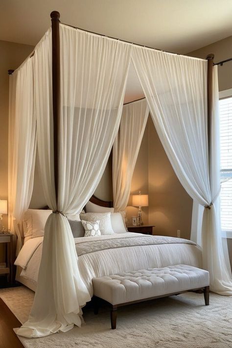 Canopy beds have long been associated with luxury and romance. These stunning centerpieces can instantly elevate your bedroom's ambiance and create a cozy, intimate space. Here are 15 inspiring canopy bed ideas to help you design the bedroom of your dreams. Jawai Bandh, Small Room Big Bed, Butterfly Organization, Wooden Canopy Bed, Wood Canopy Bed, Canopy Bed Frame, Earthy Bedroom, Bedroom Ambiance, Makeover Bedroom