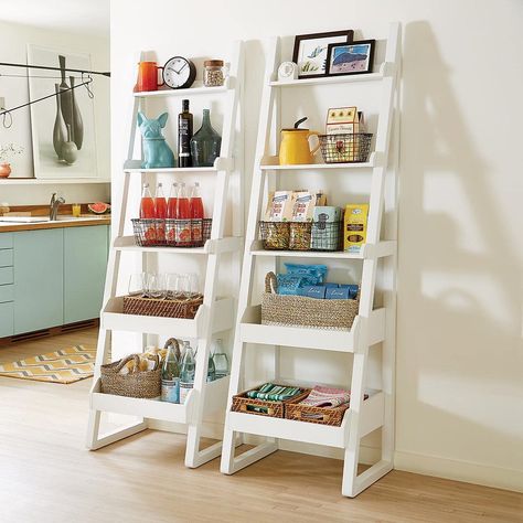 Not every home has a walk in pantry, but the ones that do have so much potential! Just think of all the things you can store in there - appliances, pa... | Set Up Bookcases #walkinpantry #pantry #storage #kitchenpantry #kitchenstorage #decoratedlife Colorful Apartment Decor, Ladder Shelf Decor, Narrow Bookshelf, Ladder Shelves, Ladder Storage, Narrow Shelves, Decorative Shelving, Colorful Apartment, Shelving Solutions