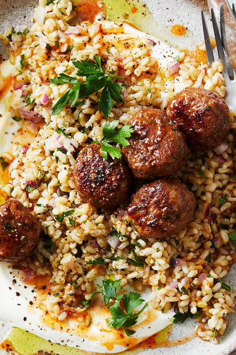 This fragrant dinner will have mouths watering before it even gets to the table. The meatballs are spiced to perfection with the perfect balance of sweetness from the honey and spiciness from the harissa. But what is harissa and what does it taste like? Harissa is a chilli pepper paste from North Africa, a region known as ‘Maghreb’. This deliciously spicy chilli condiment is available as a paste, but making your own only takes 10 minutes with this super easy harissa recipe. Harissa Meatballs, Harissa Recipe, Harissa Recipes, Spicy Chilli, Fresh Olives, Pepper Paste, Tasty Meatballs, Lamb Meatballs, Lamb Dishes