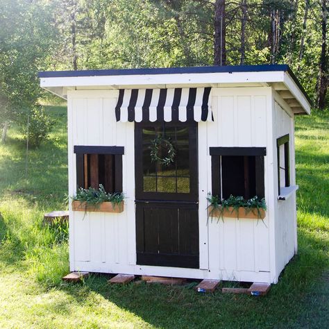 Stephanie Fromm| DIY on Instagram: “This playhouse is coming along so nicely. So far I have painted, added window boxes, a cute awning, and changed out the front door! I…” Playhouse Window Ideas, Playhouse Awning, Playhouse Upgrade, Playhouse Windows, Playhouse Door, Duck Ideas, Garden Shed Interiors, Playhouse Ideas, Diy Playroom