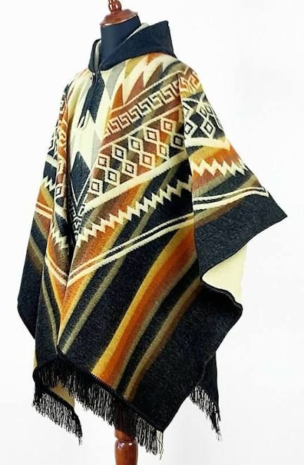 AllFreeCrochet - 1000s of Free Crochet Patterns Poncho With Hood Pattern, Poncho Reference, Fantasy Desert Clothing, Fantasy Poncho, Rustic Clothes, Winter Hippie, Aztec Clothing, Poncho Fashion, Poncho With Hood