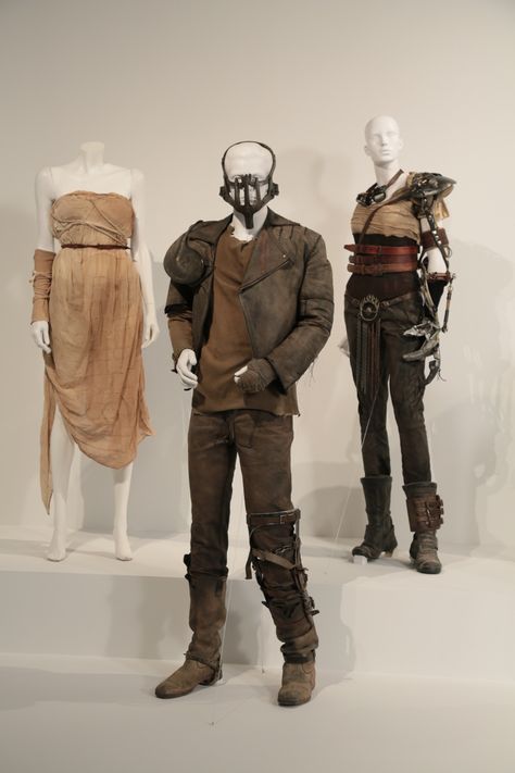 Mad Max: Fury Road costumes by Jenny Beavan, Academy Award nominee for Costume Design. These costumes can be seen in the 24th Annual "Art of Motion Picture Costume Design" exhibition, FIDM Museum, Los Angeles. The exhibition is free to the public, Tuesday, February 9 through Saturday, April 30, 2016, 10:00 a.m. - 5:00 p.m. ..(L to R) Costumes worn by actors: Courtney Eaton as Cheedo the Fragile, Tom Hardy as Max Rockatansky, Charlize Theron as Imperat Furiosa.(Photo: Alex J. Berliner/ABImages) Mad Max Fury Road Costumes, Furiosa Costume, Mad Max Cosplay, Mad Max Costume, Max Rockatansky, Morgana Le Fay, Imperator Furiosa, Marla Singer, Post Apocalyptic Costume