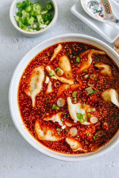 Hot and Sour Dumpling Soup is a dish from Shaanxi Province—plump dumplings served in a spicy, sour soup seasoned with Chinese black vinegar.  Source: thewoksoflife.com Sweet And Sour Soup, Vegetable Dumplings, Dumpling Soup, Woks Of Life, The Woks Of Life, Frozen Dumplings, Pork Dumpling, Sour Foods, Hot And Sour Soup