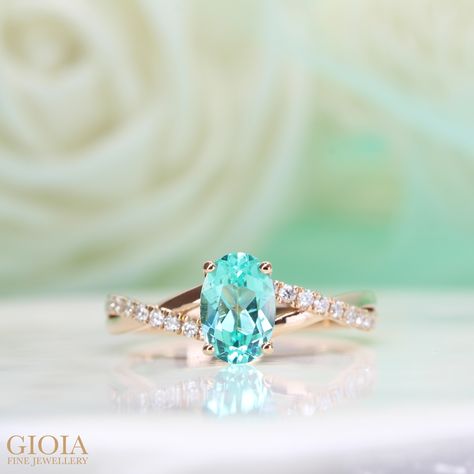 Paraiba Tourmaline Engagement Ring  Featuring a customised paraiba ring intertwining with brilliant round pave diamonds.  Congratulations and warmest wishes for your engagement!  Wishes Felix and Ying Huey, lots of love and happiness on this new chapter together. Engagement Rings Turquoise Diamond, Paraiba Ring, Paraiba Tourmaline Engagement Ring, Engagement Wishes, Paraiba Tourmaline Ring, Tourmaline Engagement Ring, Warmest Wishes, Pink Engagement Ring, Timeless Engagement Ring