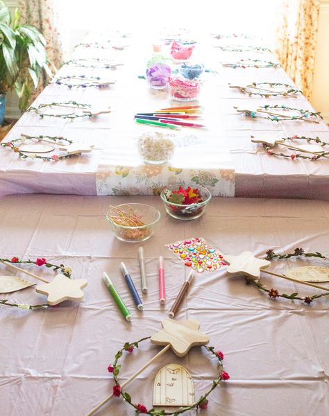 Throw an easy fairy birthday party with these creative ideas: fairy themed games, fairy crafts, a fairy birthday cake, and decorations! fairy-themed party | fairy birthday ideas | fairy cake | fairy cupcakes | fairy birthday decorations | fairy wand craft | fairy door craft | fairy crowns Simple Fairy Birthday, Fairy Diy Decor, Kids Fairy Birthday Party, Simple Fairy Birthday Party, Princess Fairy Party, Fairy Goodie Bags Ideas, Elf And Fairy Party, Fairy Birthday Diy, Fairies Party