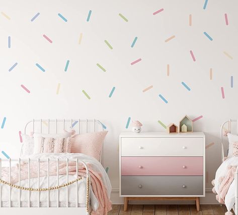 Beautiful pastel colour sprinkle/confetti wall stickers. The best way to add colour to your walls in minutes! 
   Simply peel & stick to apply. Pack contains 112 colourful confetti wall stickers. 
 Easy to apply, removable, affordable. Perfect nursery wall decal stickers for rented properties. 
 SIZING 
Each pastel colour sprinkle measure 1.8 cm x 10 cm. The pack contains a range of pastel pink, pastel blue, pastel green and other pastel colour confetti wall decals. You will receive 8 x A5 s Confetti Wall Decals, Wall Decals For Nursery, Colourful Confetti, Brand Wall, Confetti Wall, Perfect Nursery, Stickers Easy, Pastel Nursery, Pastel Wall Art