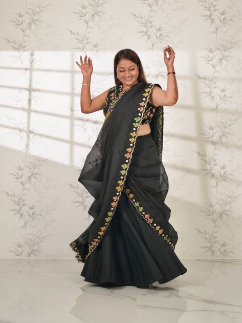 Dolly Jain | This Navratri, let’s add some extra drama with the D’Coat and a beautiful drape on it. It’s going to be so much fun as it enhances your waist and shows... | By Dolly Jain | Facebook Dolly Jain, Beautiful Drapes, Indian Outfits, Drama, Quick Saves