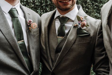 Sage and Grey groomsmen suit are yhe ultimate wedding colors. Green And Gray Suit Men, Grey And Green Tuxedo, Dark Grey Groomsmen Suits Green Tie, Fall Wedding Gray Suit, Dark Grey And Sage Wedding, Grey Suit Olive Green Tie, Light Grey Groomsmen Suits With Sage Green, Gray And Green Suit, Gray Suit Green Tie Wedding