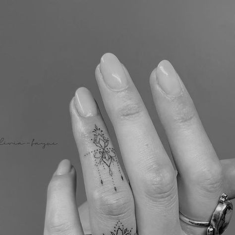 Olivia Fayne on Instagram: "Custom finger tattoos to compliment Kate’s wedding band and engagement rings 🥰 do we like finger tattoos? ♥️ #fingertattoos #tinytattoos" Wave Ring Tattoo, Olivia Fayne Tattoo, Wedding Finger Tattoo, Tattoo Waves, Lotus Mandala Tattoo, Wedding Finger, Lotus Mandala, Finger Tattoo, Waves Tattoo