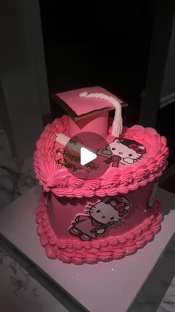 Pamela Anaele on Instagram: "Congrats Carina! Hello Kitty Graduation heart cake🤩. I love everything about this cake. From the heart shape to the color pink, the gold sugar pearls, the hello kitty’s around and on top the cake and of course the glitter. #baltimorebaker #baltimorecakes #pinkcake #glittercake #heartcake #vintagecake #cakereels #caketrends #trendingreels #dmvbaker #dmvcakes #instacake #customcakes #cakesofinstagram #birthdaycake #cutecake #blowthisup #graduationcake #graduationcap #hellokitty #hellokittycake" Hello Kitty Graduation Cakes, Hello Kitty Graduation, Graduation Party Cupcakes, Diamond Birthday, The Color Pink, Kitty Cake, Heart Shaped Cakes, Hello Kitty Cake, Delicious Snacks