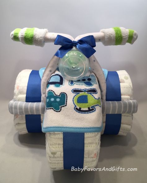 Baby Boy Diaper Cake Ideas, Unique Diaper Cakes For Boys, Boy Diaper Cake Ideas, Creative Diaper Cakes, Nappy Cake Ideas, Diaper Tricycle, Diaper Cake Ideas, Baby Shower Unique, Unique Diaper Cakes