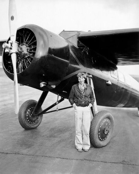 Earhart, Amelia Mary, standing in front of her Lockheed Model 5C Vega NR965Y, at Wheeler Field, Oahu, Territory of Hawaii, 11 January 1935. (Getty Images, Underwood Archives) Gap Ads, Female Aviator, Women In Aviation, Female Pilots, Hilary Swank, Female Pilot, Amelia Earhart, Air And Space Museum, Vintage Aviation