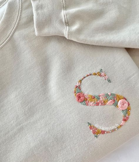 These colors have been popular lately! Fun fact: these similar colors were the first ones I ever tried when I first started creating my birth year t-shirts, and it’s always fun to come back to them ☺️ #embroideredclothing #embroidery #flowersembroidery #flowerlovers #initial #cutegift Embroidery On Dress, Boho Art Drawings, Acrylic Painting Tips, Fabric Embroidery, Birth Year, Embroidered Clothes, Embroidery Fonts, Boho Art, Embroidery And Stitching