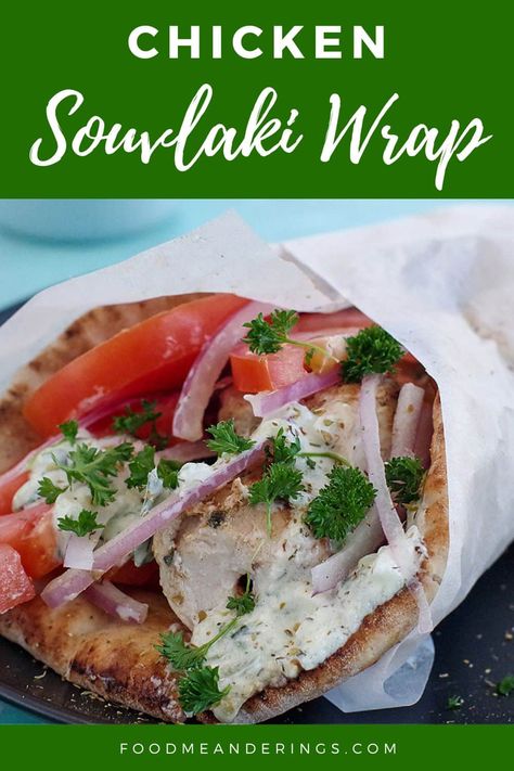 Greek chicken souvlaki wrapped in pita with tomatoes, red onion, tzatziki and parsley, wrapped in paper on black plate Chicken Souvlaki Wrap, Souvlaki Wrap, Ww 2023, Greek Style Potatoes, Greek Lasagna, Grilled Sandwich Recipe, Greek Chicken Souvlaki, Souvlaki Recipe, Greek Pasta Salad Recipe