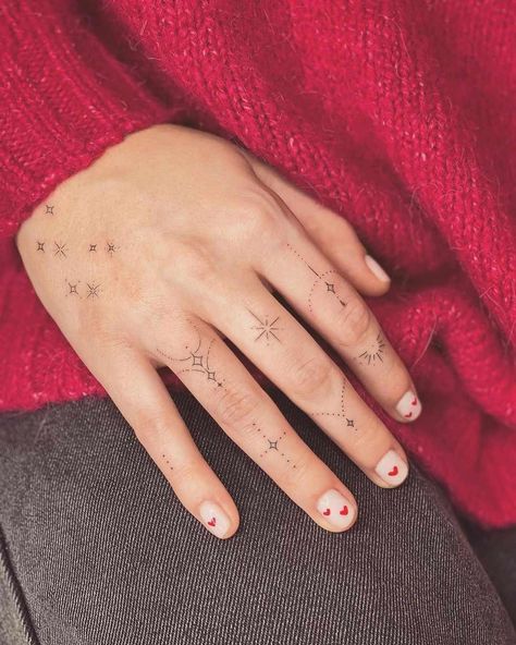 9 Tiny Cuticle Tattoo Ideas We're Copying From Celebs Finger Tattoo Ideas For Women, Cuticle Tattoos, Tattoo Design Ideas For Women, Finger Tattoo Ideas, Simple Hand Tattoos, Sparkle Tattoo, Hope Tattoo, Tiny Finger Tattoos, Celtic Knot Tattoo