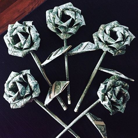 Money roses money flower origami money rose dollar rose Money Flower Origami, Money Roses, Rose Money, Money Origami Heart, Money Craft, Money Cakes, Magic Tricks Tutorial, Origami Money, Flower Origami