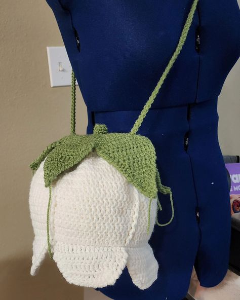 Sneak peek 👀 my new pattern Lily of The Valley crossbody bag. This is just the prototype. Making the necessary adjustments and then I'll be calling for a tester call ☺️☺️ #crochetersoftheworld #crochetersofinstagram #crochetdesign #crochet #crocheted #crochetbag #crochetdesign #crochetdesigner #crochetstitches #bag #flower Lily Of The Valley Crochet, Crochet Lily, Lily Bag, Crochet Bouquet, Bag Flower, Crochet Bags, Fiber Arts, Lily Of The Valley, Hat Pattern