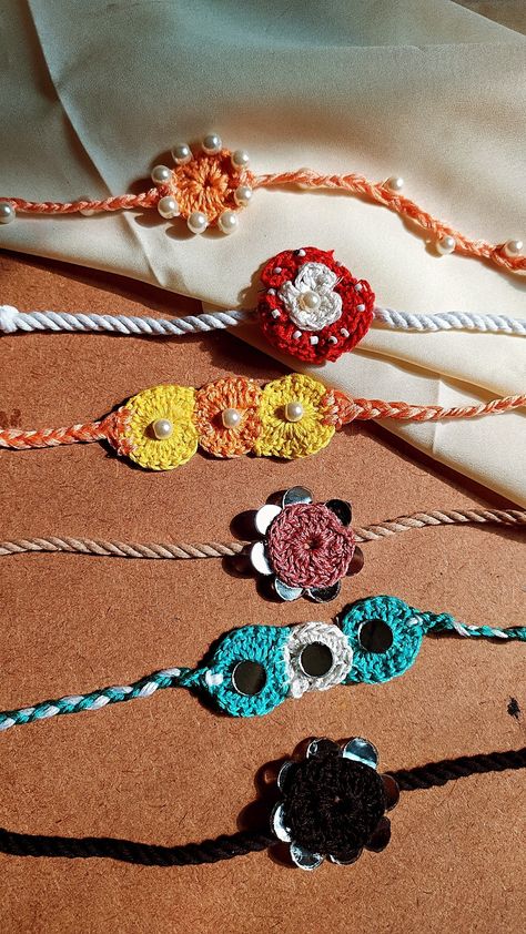 Rakhi simple handmade beaded crochet crochet work Crochet Rakhi, Rakhi Diy, Hand Jewelry, Business Ideas, Handmade Crochet, Crochet Baby, Crochet Earrings, Crochet, Handmade Gifts