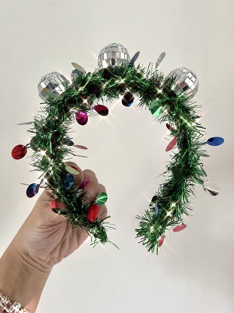 🎄Christmas tinsel headbands with silver disco balls 🎄These Alice bands are lightweight and comfy to wear. With lots of green tinsel and cute disco balls on the top. 🎄These cute headbands are great for getting into the festive spirit.  🎄Add with your favourite Christmas jumper or on it's own, it's a great timeless statement piece that you can wear year after year.   🎄Suitable for ages 8-100 Tinsel Headband, Alice Bands, Green Tinsel, Headband Crown, Christmas Tinsel, Christmas Headband, Alice Band, Cute Headbands, Disco Balls