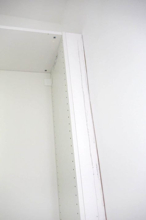 Easy Hack to Build-In an IKEA Pax Wardrobe - A Beautiful Mess Ikea Pax Closet Trim, Ikea Pax Auli Wardrobe, Ikea Pax Grimo Door Handles, Ikea Pax Trim, How To Build In Ikea Pax Wardrobe, Diy Built In Wardrobe Ideas Ikea Hacks, Ikea Pax Paint Match, Pax 75 Cm Ikea Door, Ikea Pax Wardrobe Alcove