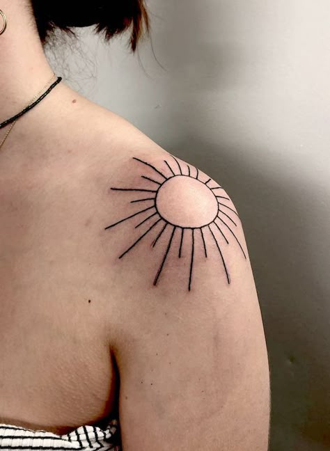 69 Beautiful Shoulder Tattoos For Women with Meaning Too Of Shoulder Tattoos For Women, Rising Sun Shoulder Tattoo, Fine Line Sun Tattoo Shoulder, Sun Shoulder Cap Tattoo, Melting Sun Tattoo, Artistic Sun Tattoo, Line Work Shoulder Tattoo, Shoulder Front Tattoo, Tattoo Around Shoulder