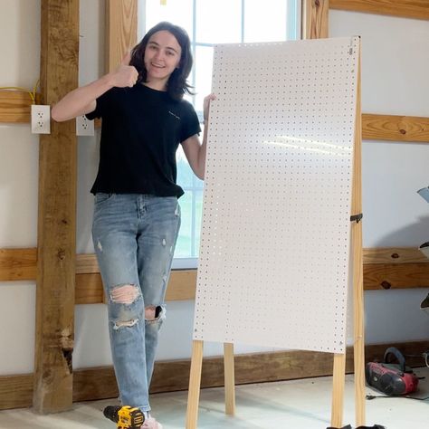 The folding pegboard easel that I take to my pop-up markets is my biggest revenue-generating display, and it's SO easy to make! Here's a tutorial. How To Make A Display Board, Folding Pegboard Display Diy, Small Pegboard Ideas, Pegboard Easel, Diy Sticker Display, Candle Shop Display, Booth Display Ideas Diy, Diy Peg Board, Sticker Display