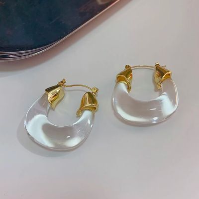 Tired of Your Gold Hoops? Try These Earrings Instead | The Everygirl Dance Earrings, Butterfly Earrings Gold, Earrings Classic, Chunky Hoop Earrings, The Everygirl, Knot Earrings, Gold Butterfly, Earring Jewelry, Classic Gold