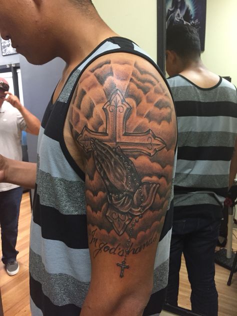 Reglious Tattoos Sleeve, Rip Shoulder Tattoo Men, Religious Shoulder Tattoo Men, Cross On Shoulder Tattoo, Quarter Sleeve Tattoo For Men Shoulder, Half Sleeve Shoulder Tattoo For Men, Shoulder Tattoo Men Clouds, Christian Shoulder Tattoo, Christian Shoulder Tattoo For Men