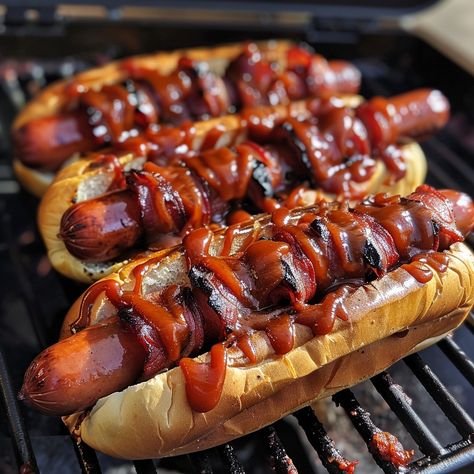 🌭 Savor the smoky richness of BBQ Bacon Wrapped Hot Dogs! 🥓 #BBQSeason 🍽️ BBQ Bacon Wrapped Hot Dogs 🛒 Ingredients: Hot dogs: 4 Bacon strips: 8 Hot dog buns: 4 BBQ sauce: 1/2 cup 👩‍🍳 Instructions: Wrap: Encase each hot dog in two bacon strips. Grill: Cook until bacon is crispy, baste with BBQ sauce. Serve: In buns, add extra BBQ sauce if desired. 🔥 Elevate your BBQ with our BBQ Bacon Wrapped Hot Dogs! #GrillingGoals Burgers And Hotdogs Party, Bbq Hot Dogs, Hot Dog Party, Bacon Wrapped Hotdogs, Wrapped Hot Dogs, Seafood Boil Recipes, Smoked Food, Instagram Recipes, Bbq Bacon