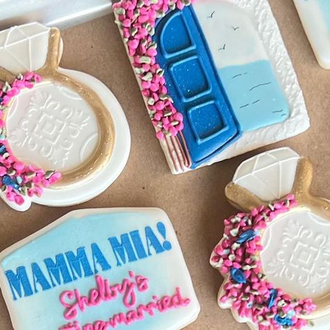 𝑲𝒓𝒊𝒔𝒕𝒂 𝑴𝒂𝒓𝒊𝒏𝒐 on Instagram: "💕Mamma Mia Bridal Shower💕 Such a cute theme for a bridal shower. Hand piping bougainvillea is no joke😅 The end result was so worth it! I’ve never seen Mamma Mia but now I can’t get the song out of my head😆 #nightowlsweetshoppe #decoratedcookies #royalicingcookies #mammamia #mammamiacookies #bridalshowercookies #mammamiabridalshower #bouganvillea #greekvillas #ringcookies #cookieart #royalicing #floralcookies #customcookies #customstencils #cookies #cookiesofinstagram #customdecoratedcookies #decoratedsugarcookies" Mama Mia Bachelorette Party Cookies, Bridal Shower Mamma Mia Theme, Mama Mia Cookies, Mamma Mia Cookies, Mama Mia Bridal Shower Theme, Mamma Mia Bridal Shower Theme, Mediterranean Birthday, Bachelorette Party Cookies, Bachelorette Cookies