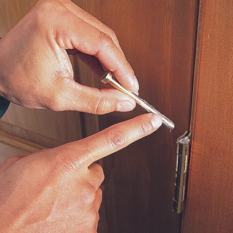 How to Silence a Squeaking Hinge (DIY) | The Family Handyman Squeaky Door Hinges, Hinges Diy, Squeaky Door, The Family Handyman, Hinge Pin, Petroleum Jelly, Cleaning Gadgets, Family Handyman, House Doors